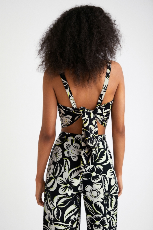 Top crop alb-negru cu imprimeu floral și nod