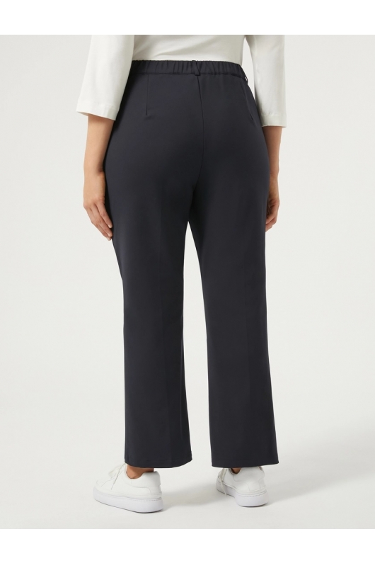 Pantaloni bleumarin evazați cu pliuri presate