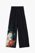 Pantaloni fluizi cu print tropical