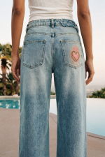 Pantaloni din denim imprimati