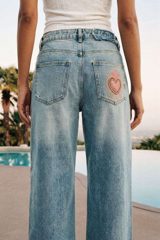 Pantaloni din denim imprimati