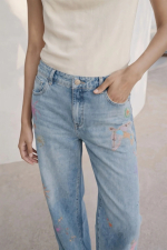 Pantaloni din denim imprimati